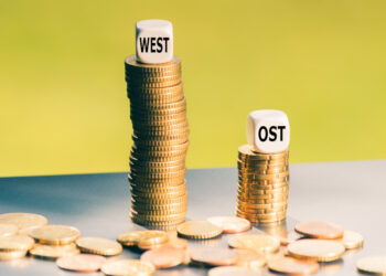 Symbol für den Lohnunterschied zwischen West- und Ostdeutschland.